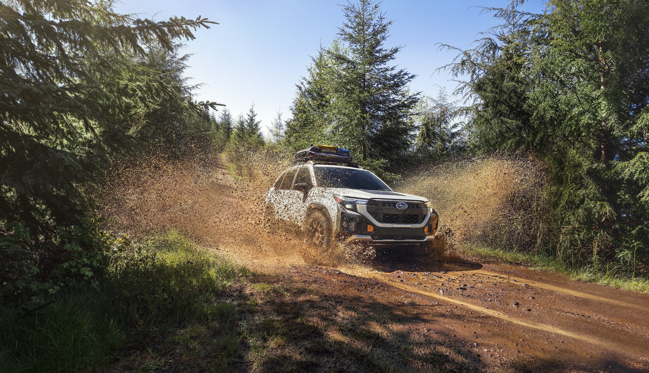 2026 Subaru Forester Wilderness driving through mud