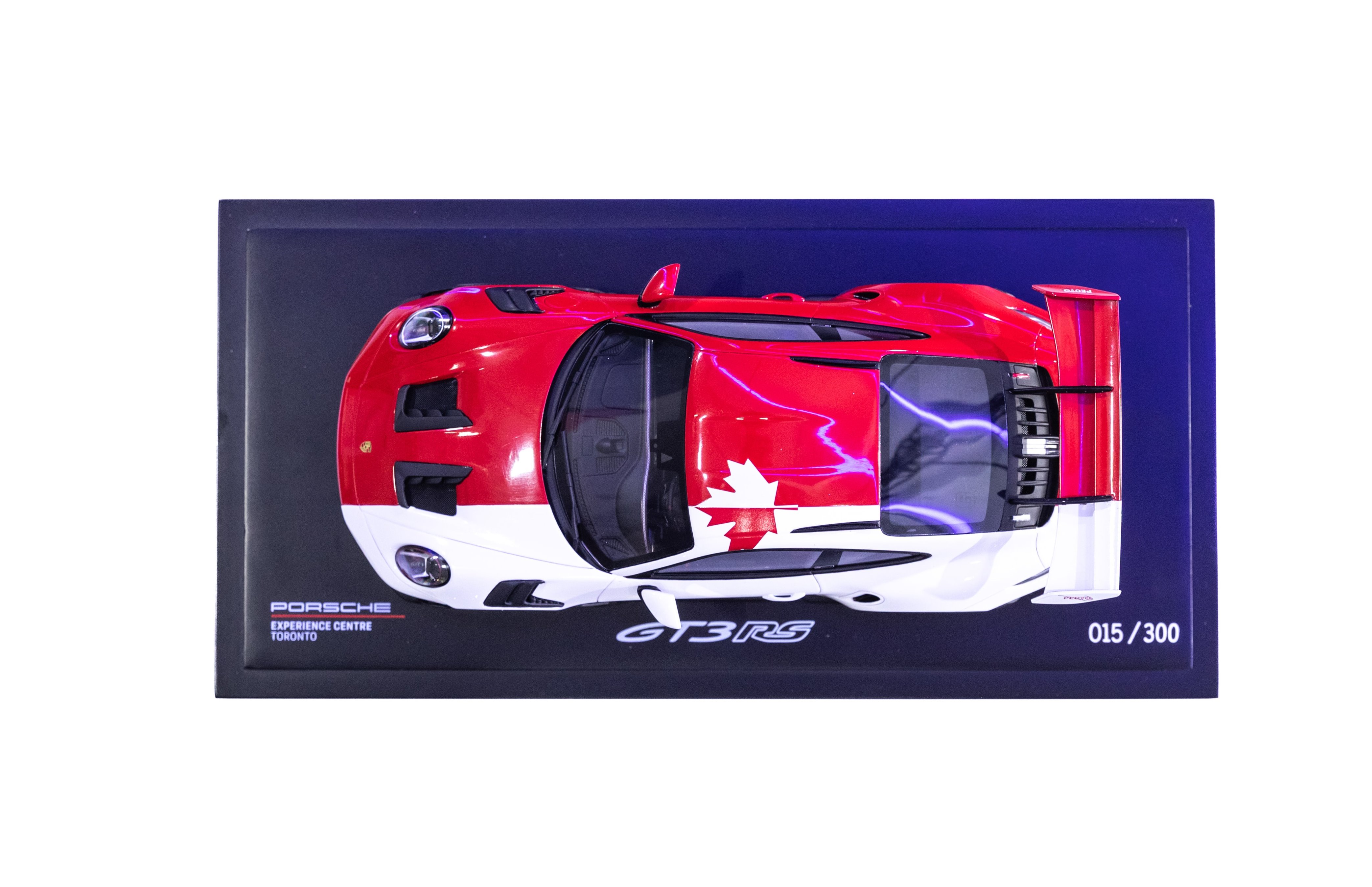 You can buy a scale model of Porsche's Canadian flag-waving car