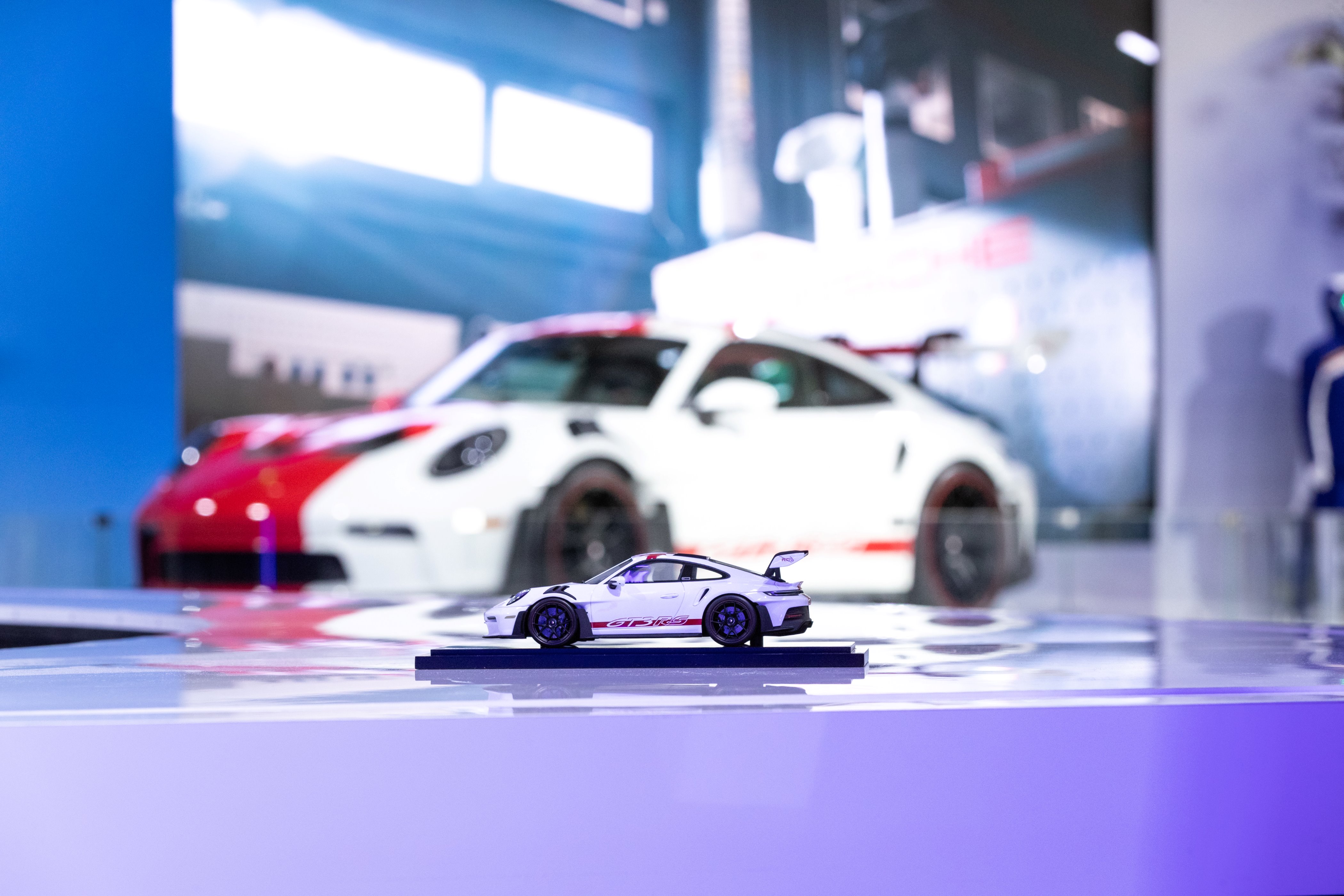 You can buy a scale model of Porsche's Canadian flag-waving car
