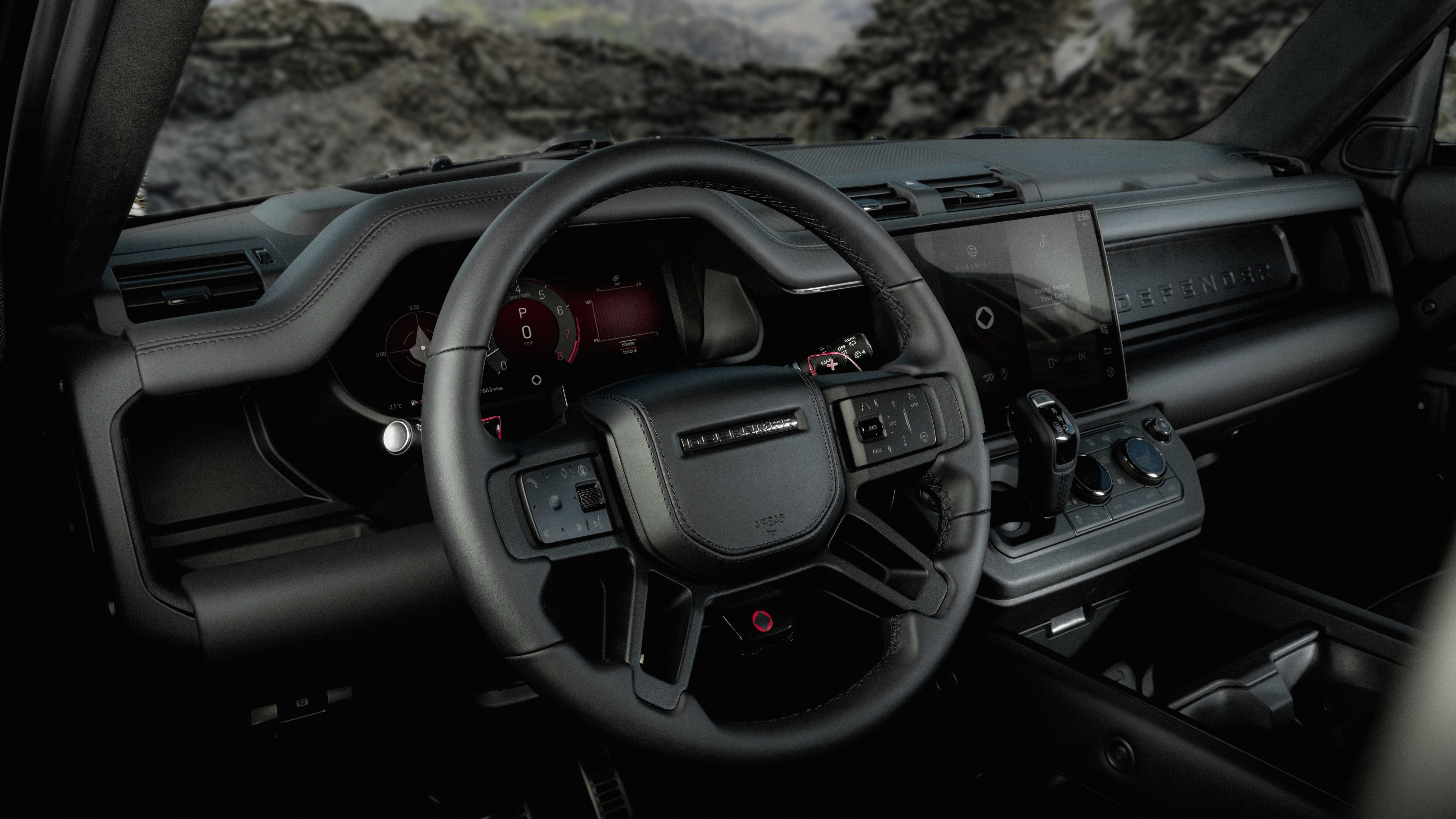2026 Land Rover Defender OCTA Black steering wheel and dashboard