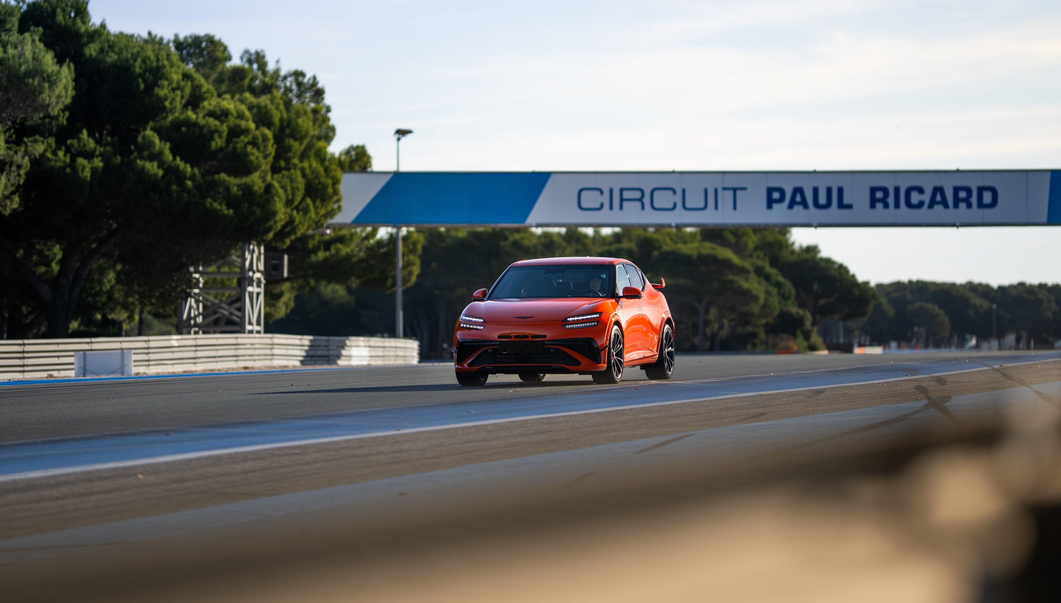 Genesis GV60 Magma on track