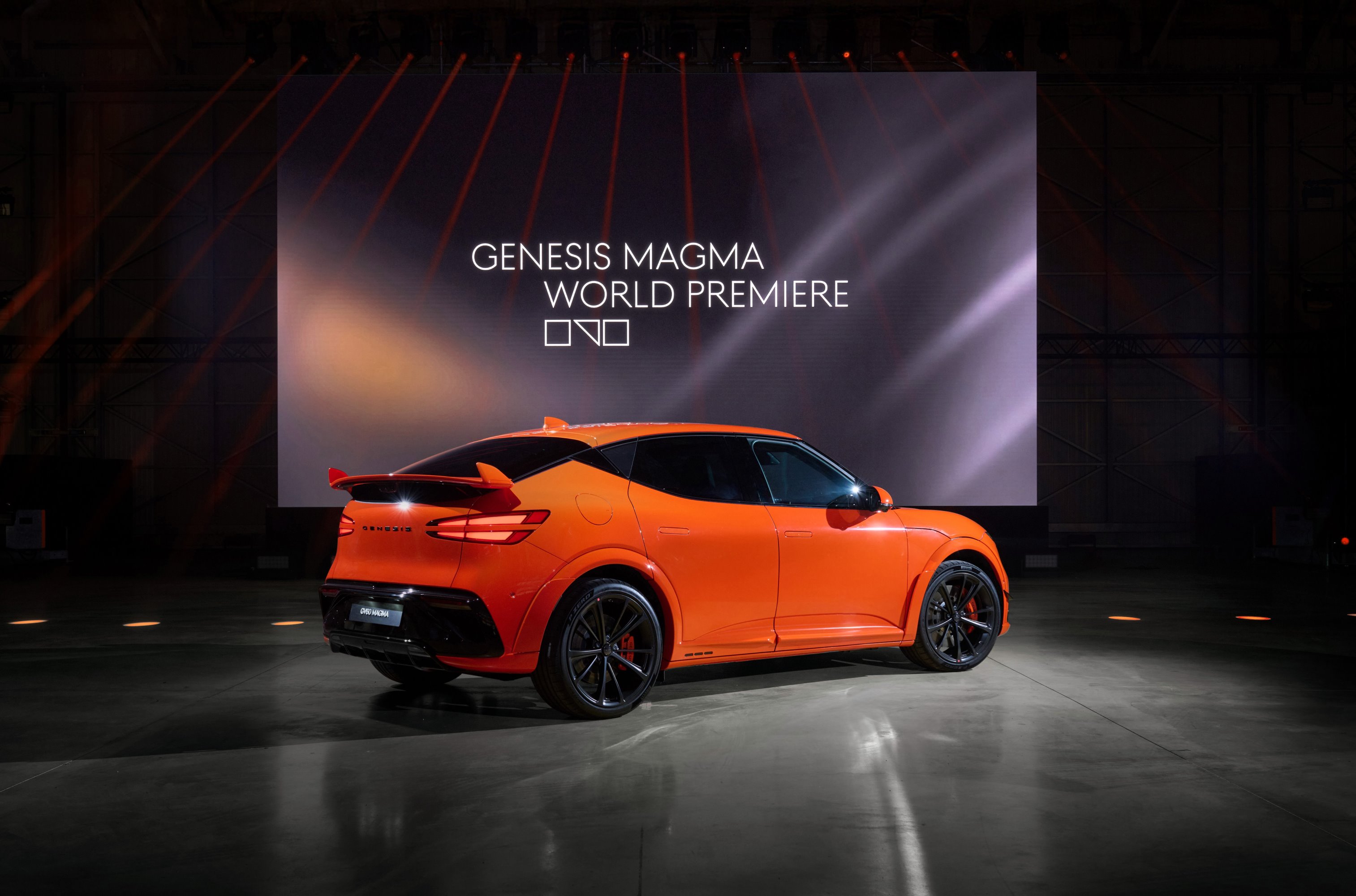 Genesis GV60 Magma on stage rear and side