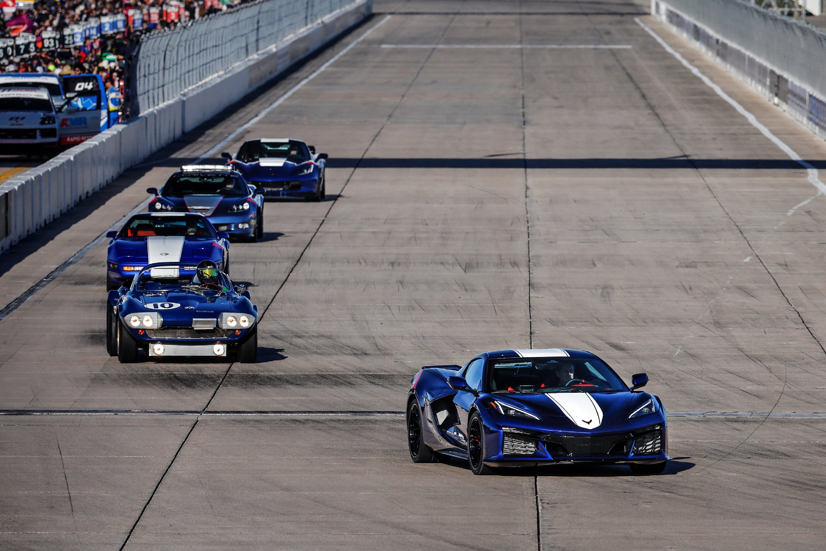 2027 Chevrolet Corvette Grand Sport at Sebring followed by older Grand Sport models