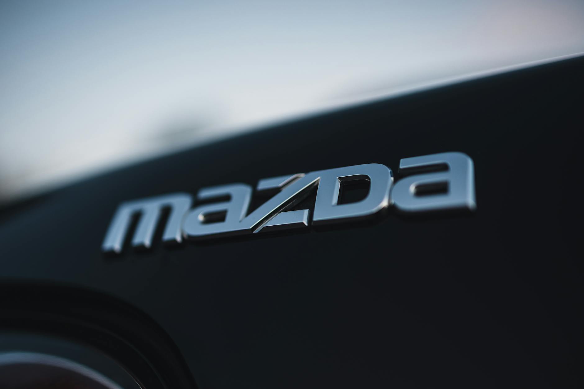 Mazda name on car