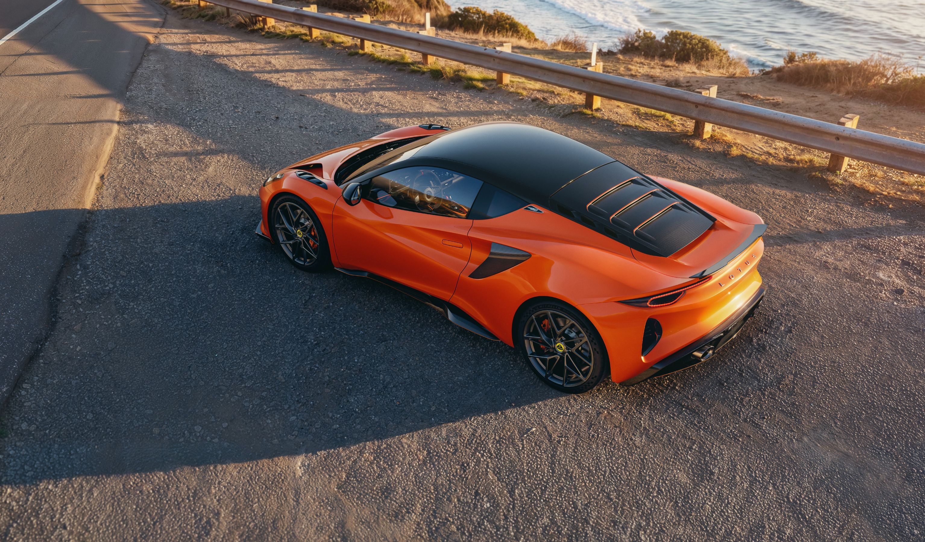 Lotus Emira 420 Sport parked on side of road