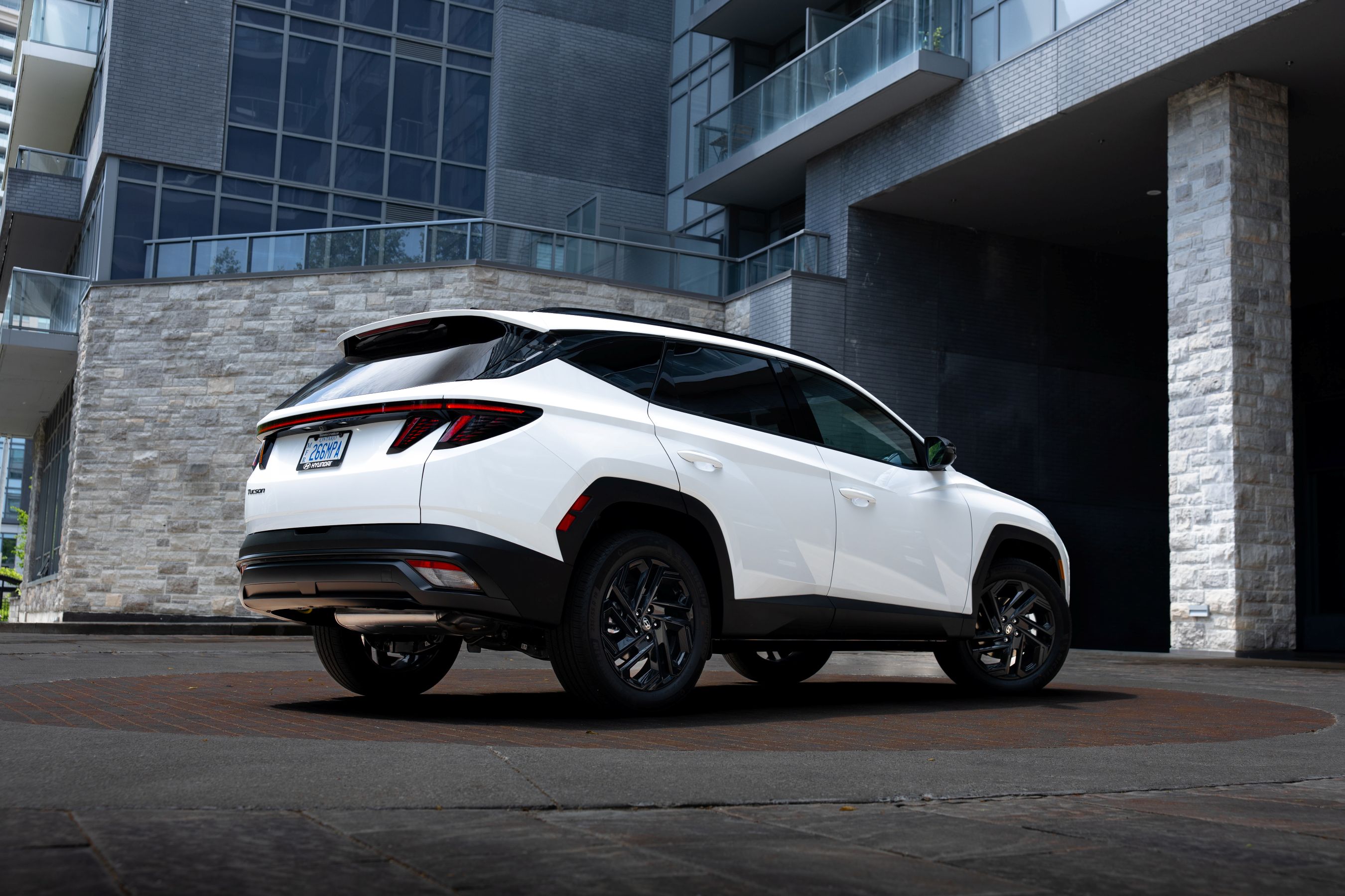 2026 Hyundai Tucson Hybrid Night Edition side and rear