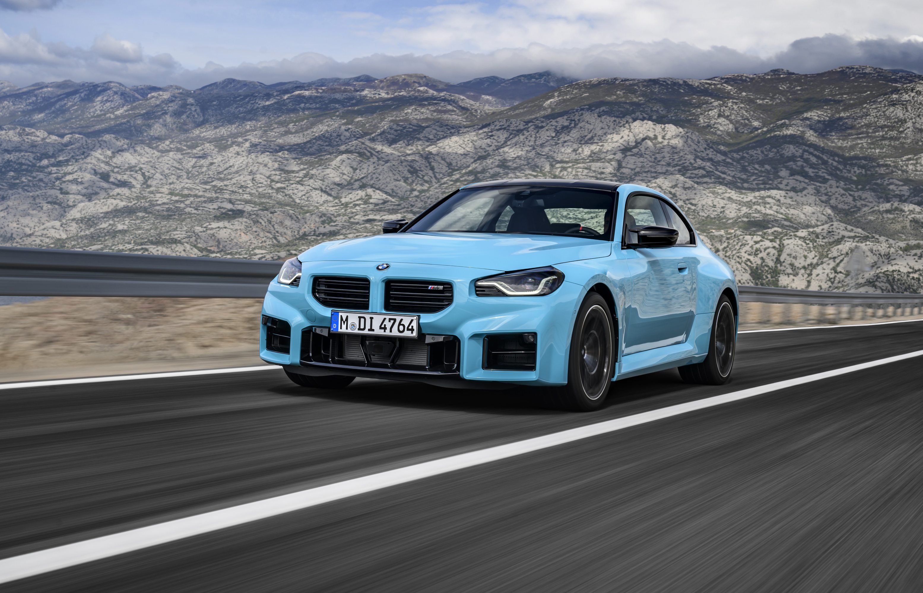 2027 BMW M2 with M xDrive front of car in motion