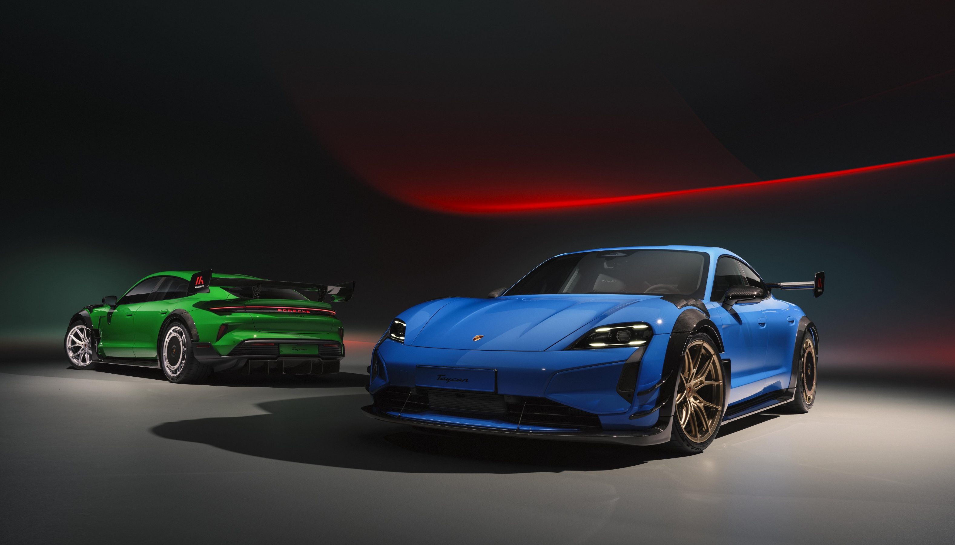 Two Porsche Taycan Turbo GT with Weissach Package cars and Manthey Package