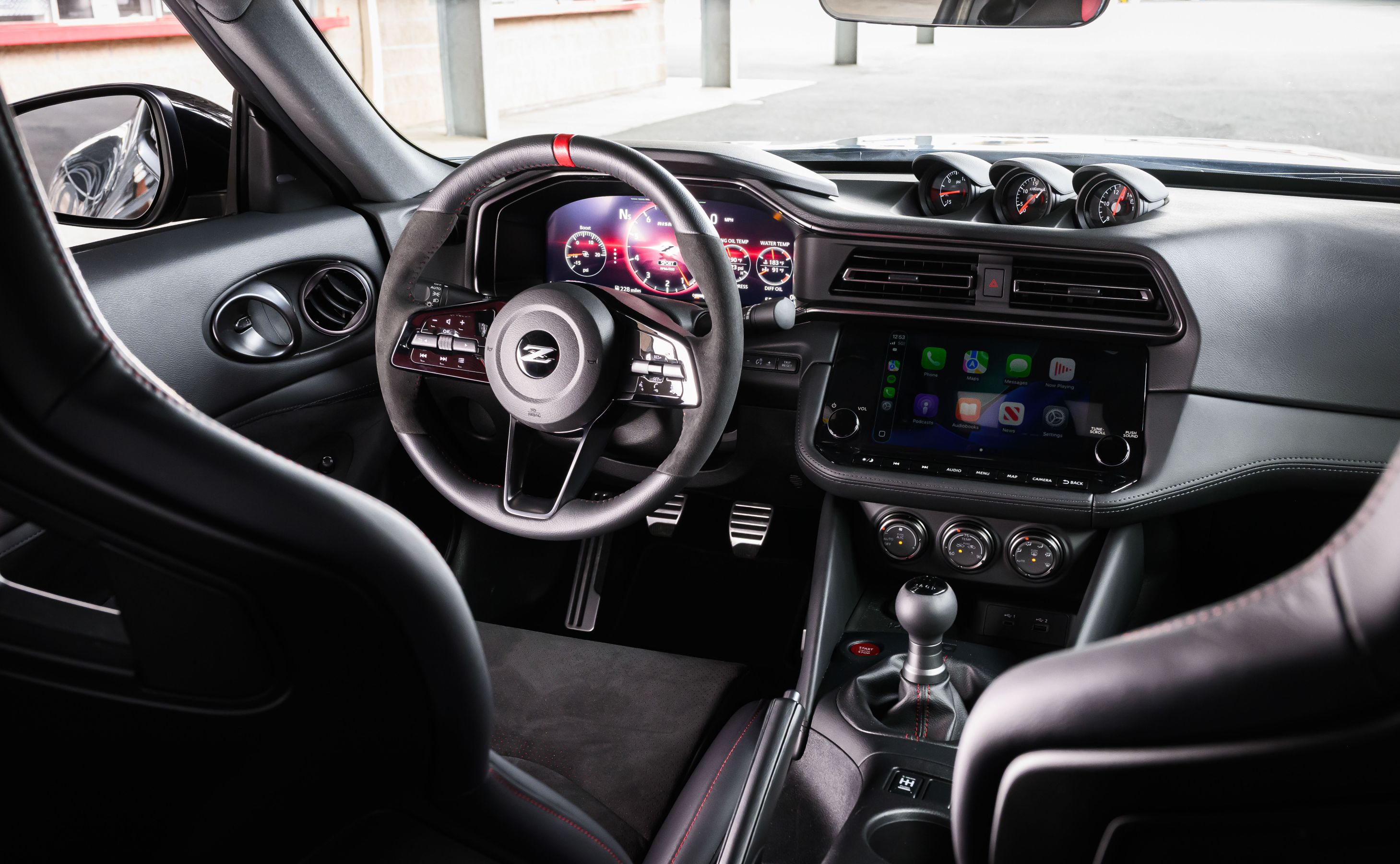 2027 Nissan Z Nismo interior with stick shift