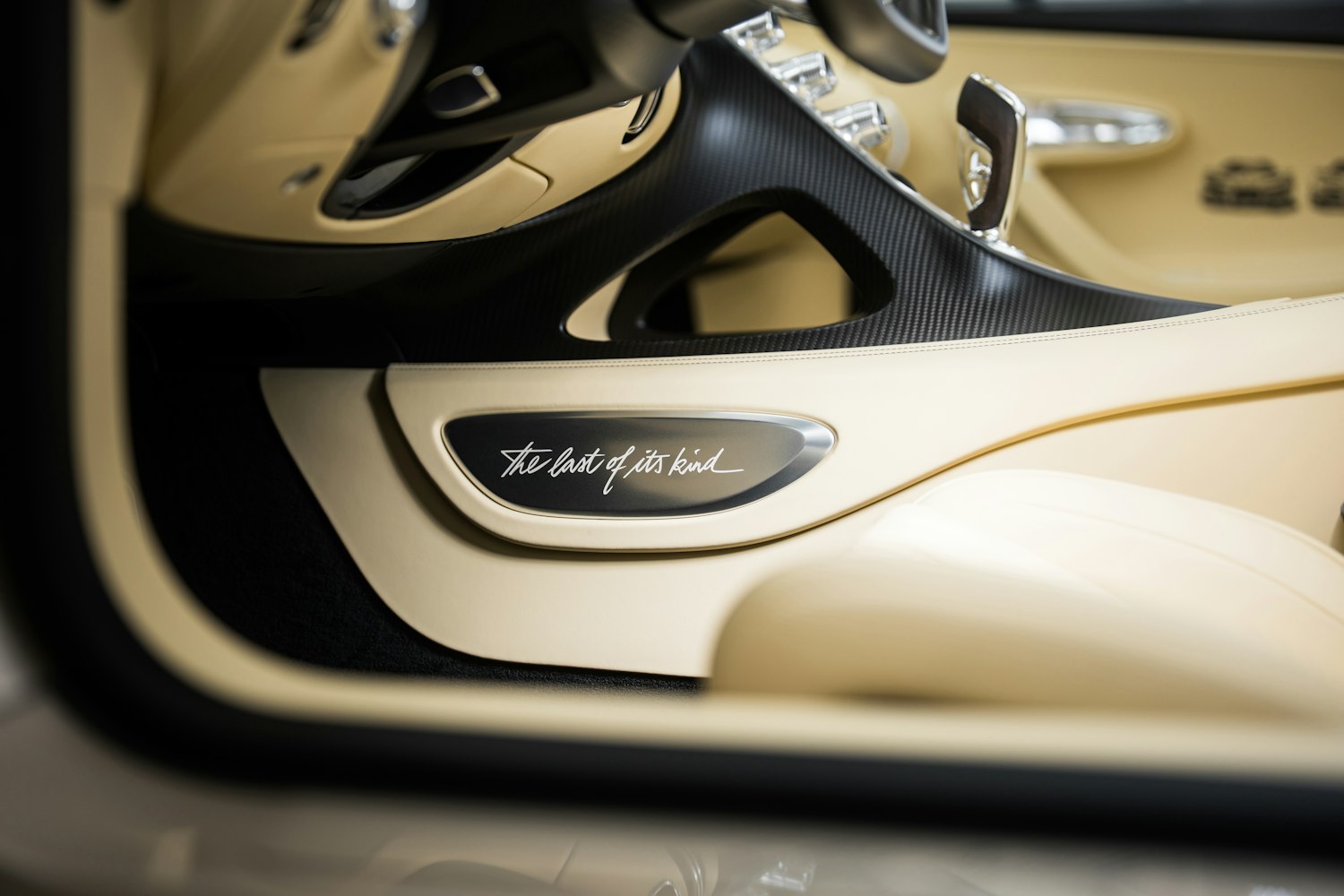 Bugatti W16 Mistral interior plaque with "the last of its kind" written