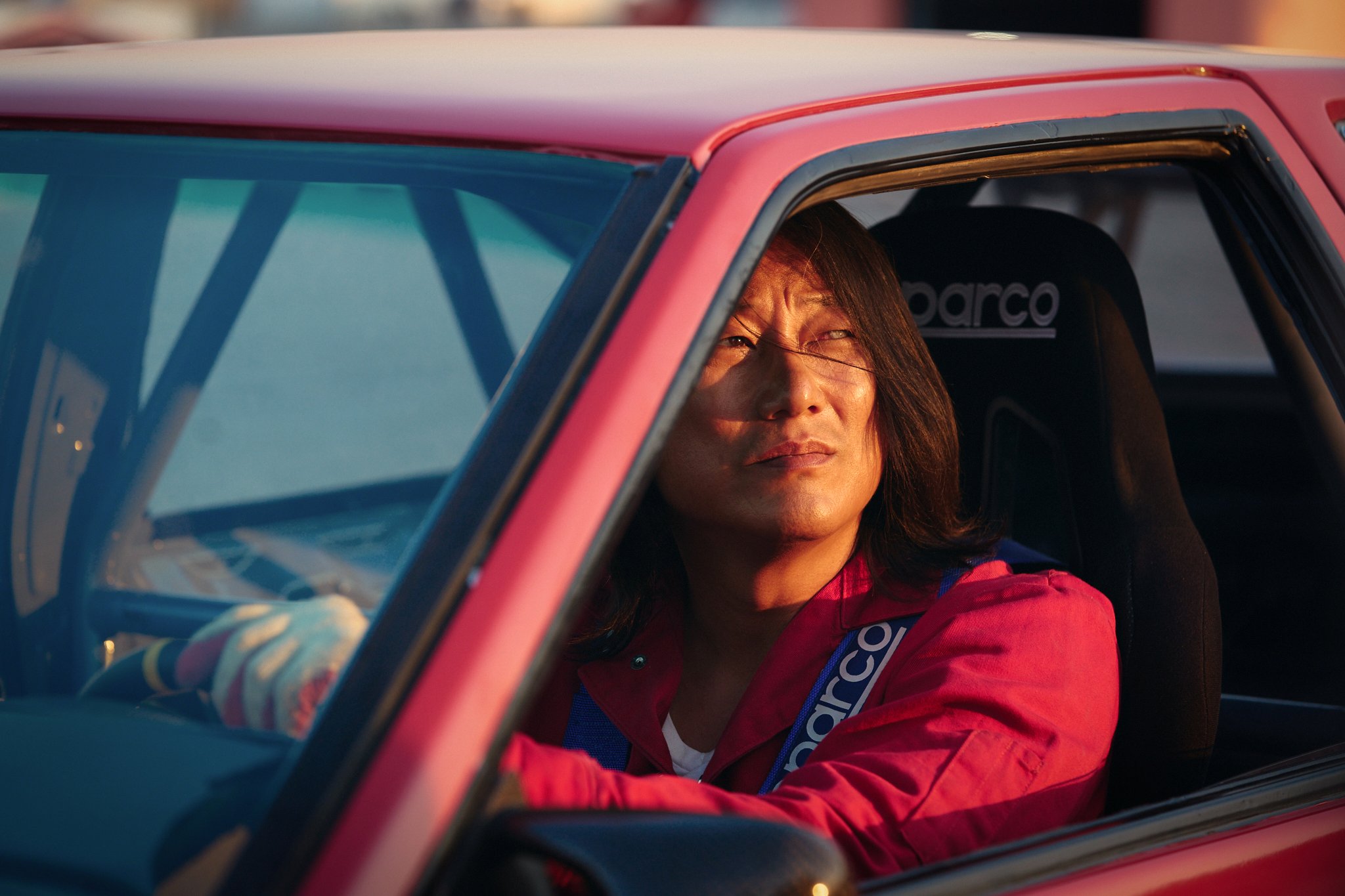 Drifter still of Sung Kang in car