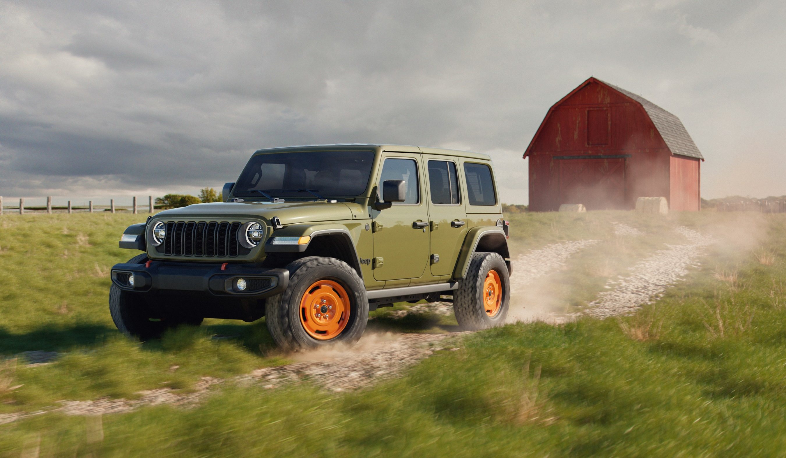 2027 Jeep Wrangler JL-2A four-door with barn in background