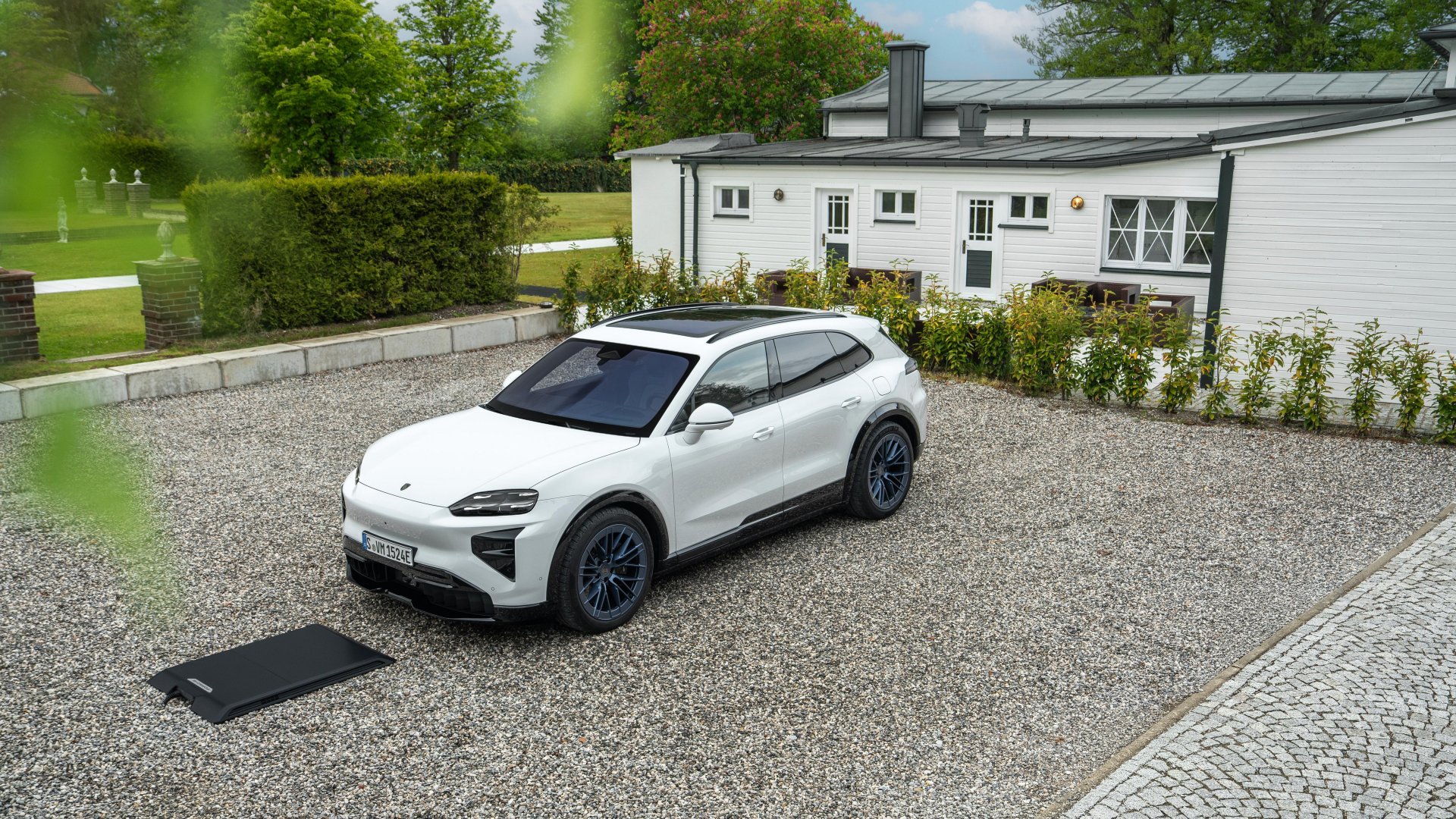Porsche Cayenne Turbo Electric with wireless charging pad