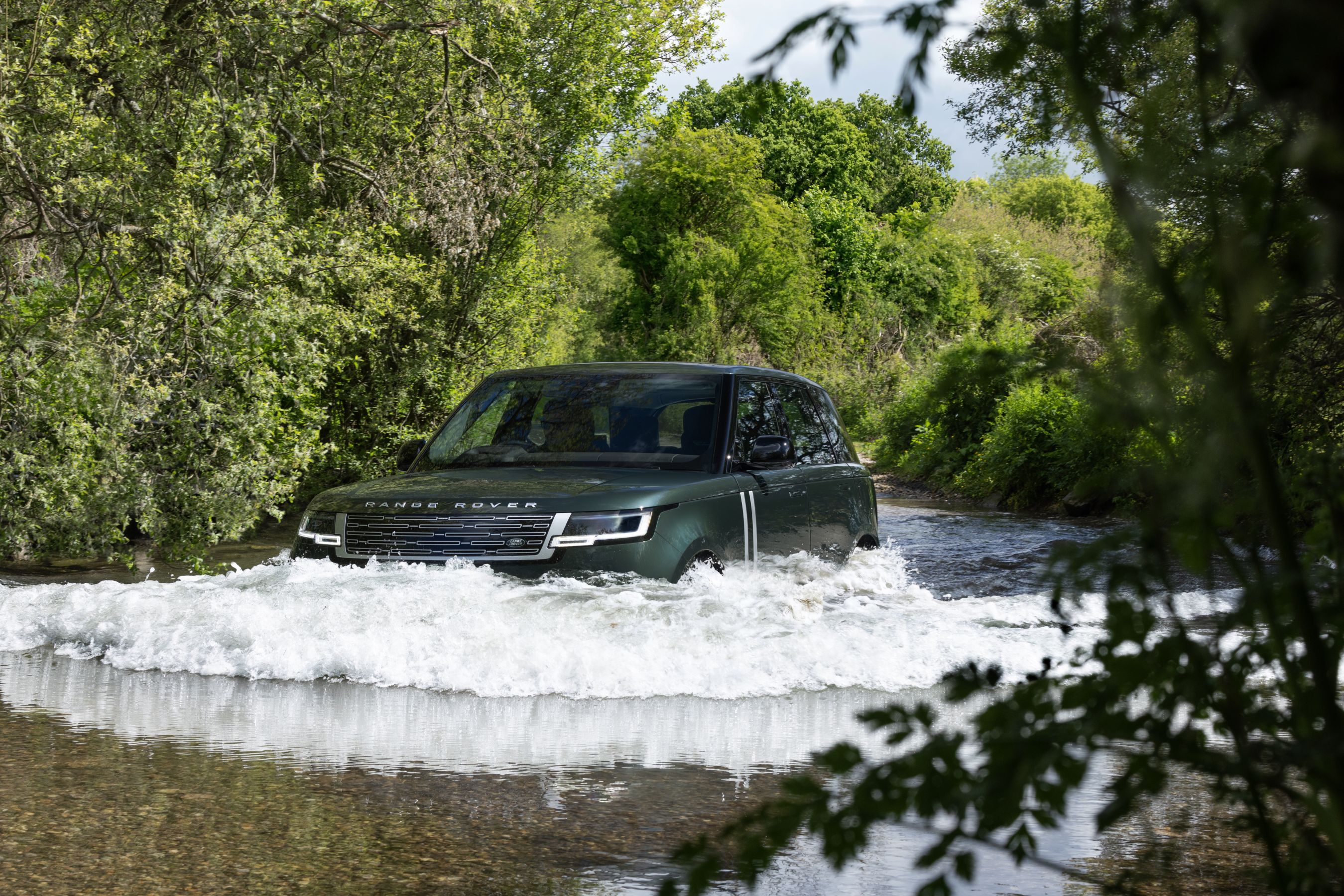 Range Rover Electric wading in river