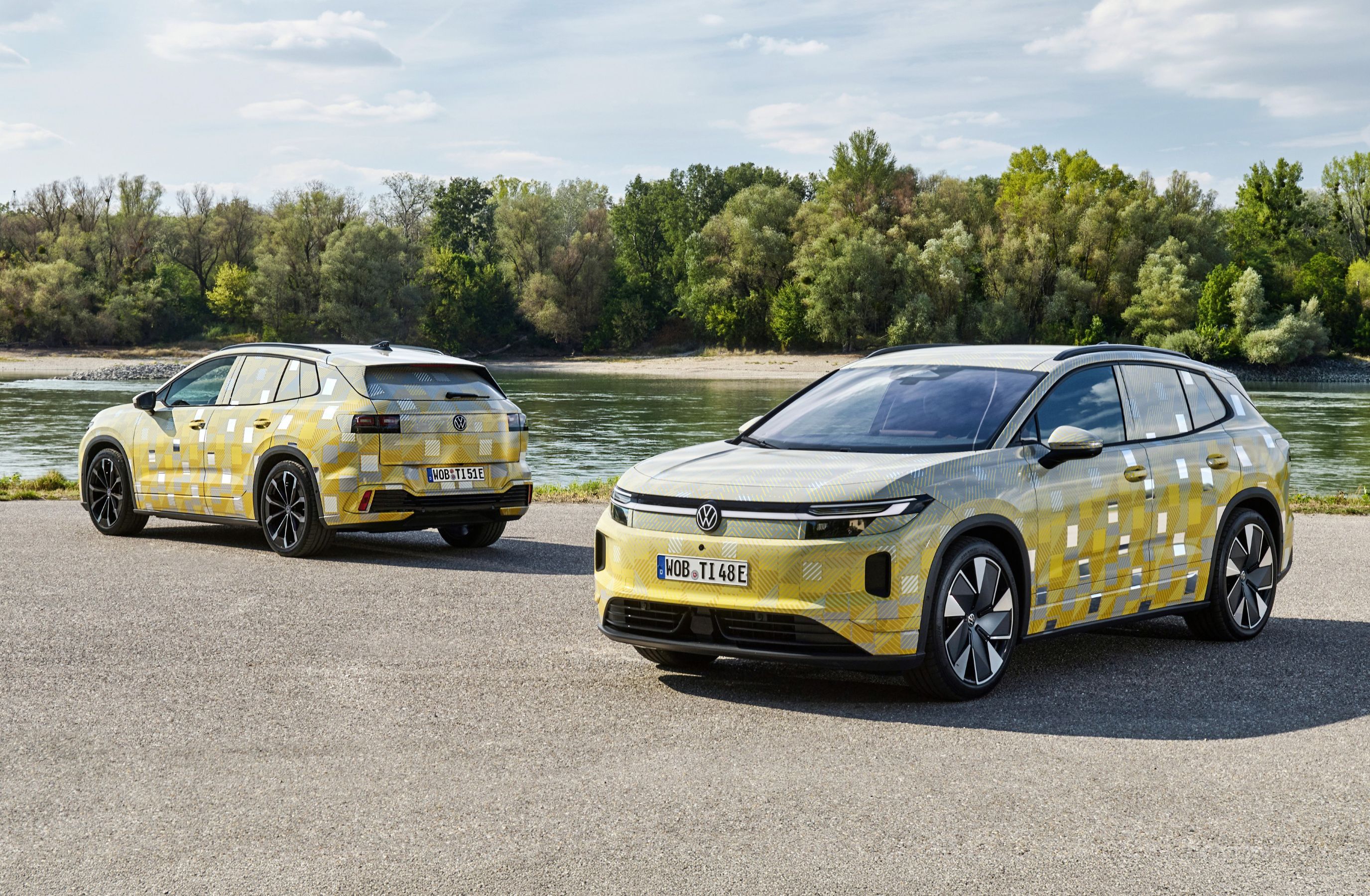 Volkswagen ID. Tiguan prototype under camouflage pair showing front and back