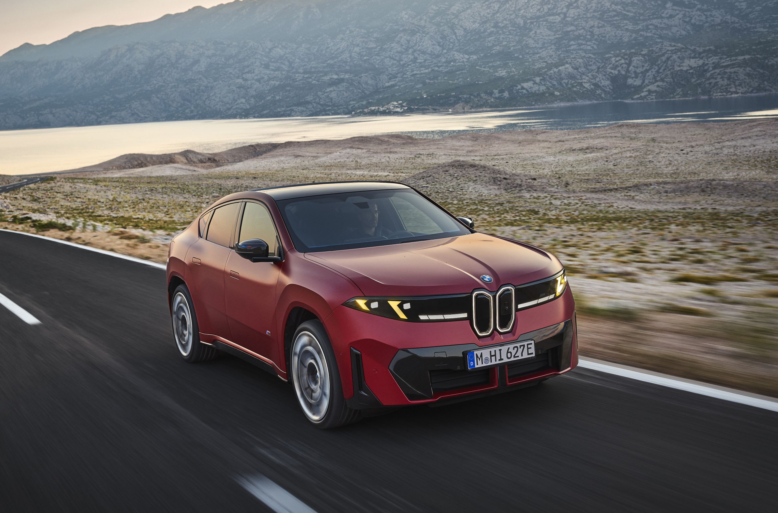 BMW iX4 M60 driving