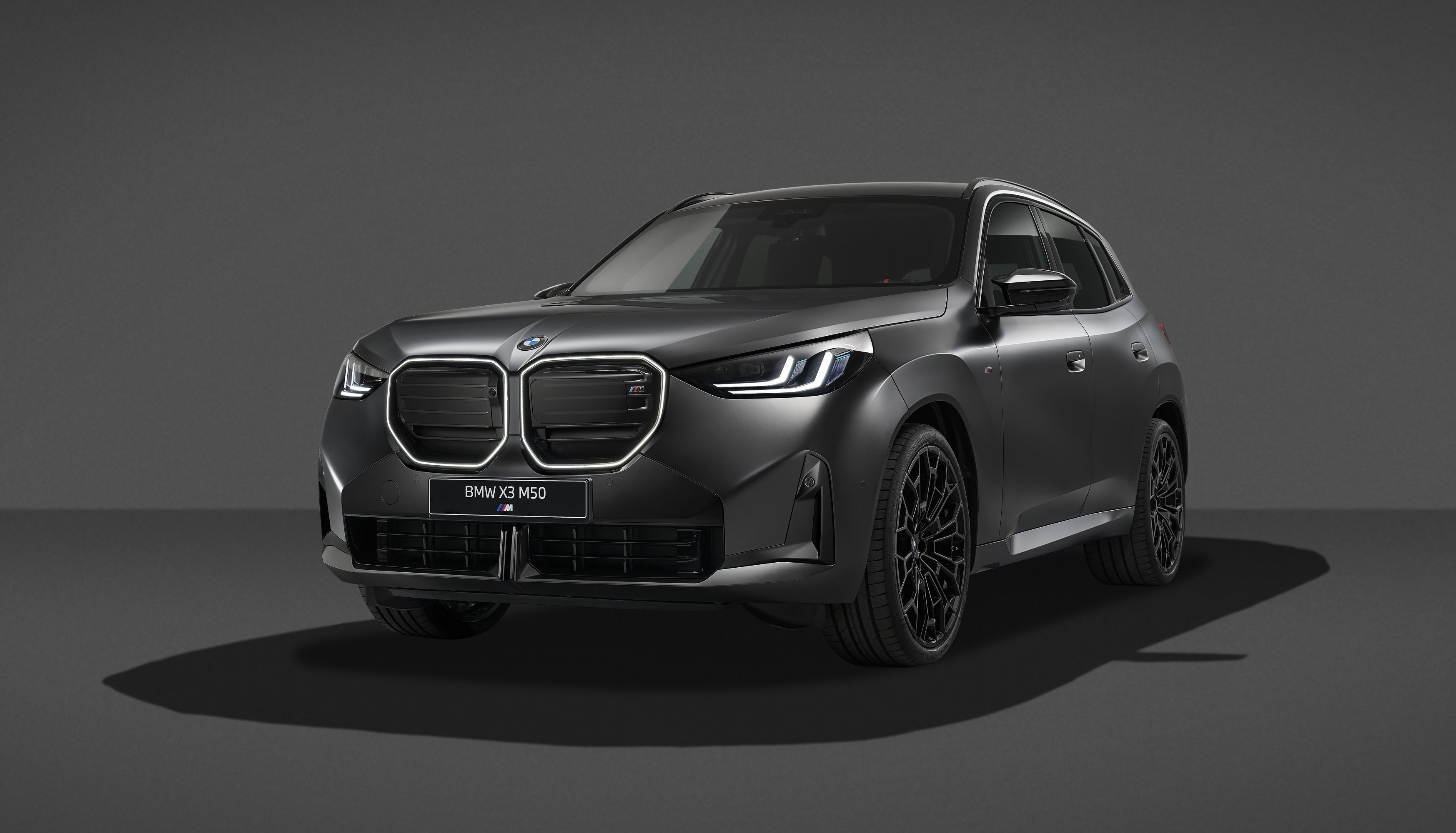 2027 BMW X3 M50 xDrive with Black Package front and side