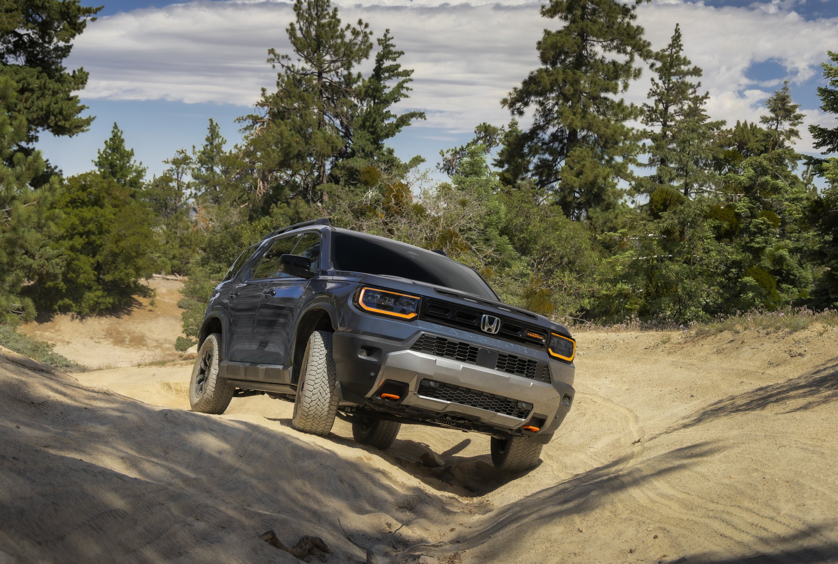 2027 Honda Passport TrailSport driving on sand