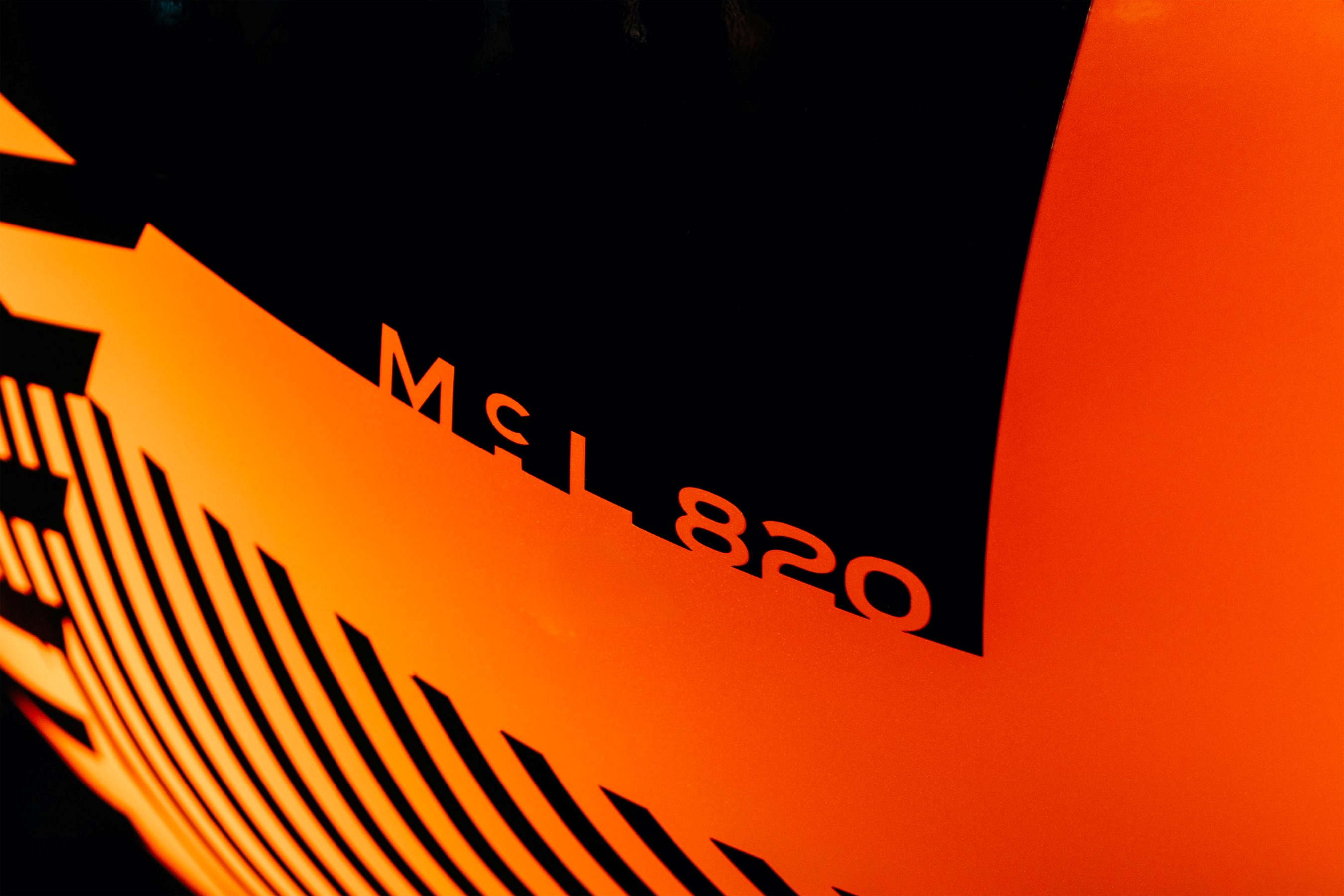 McLaren kiwi statue closeup of McL 820 name