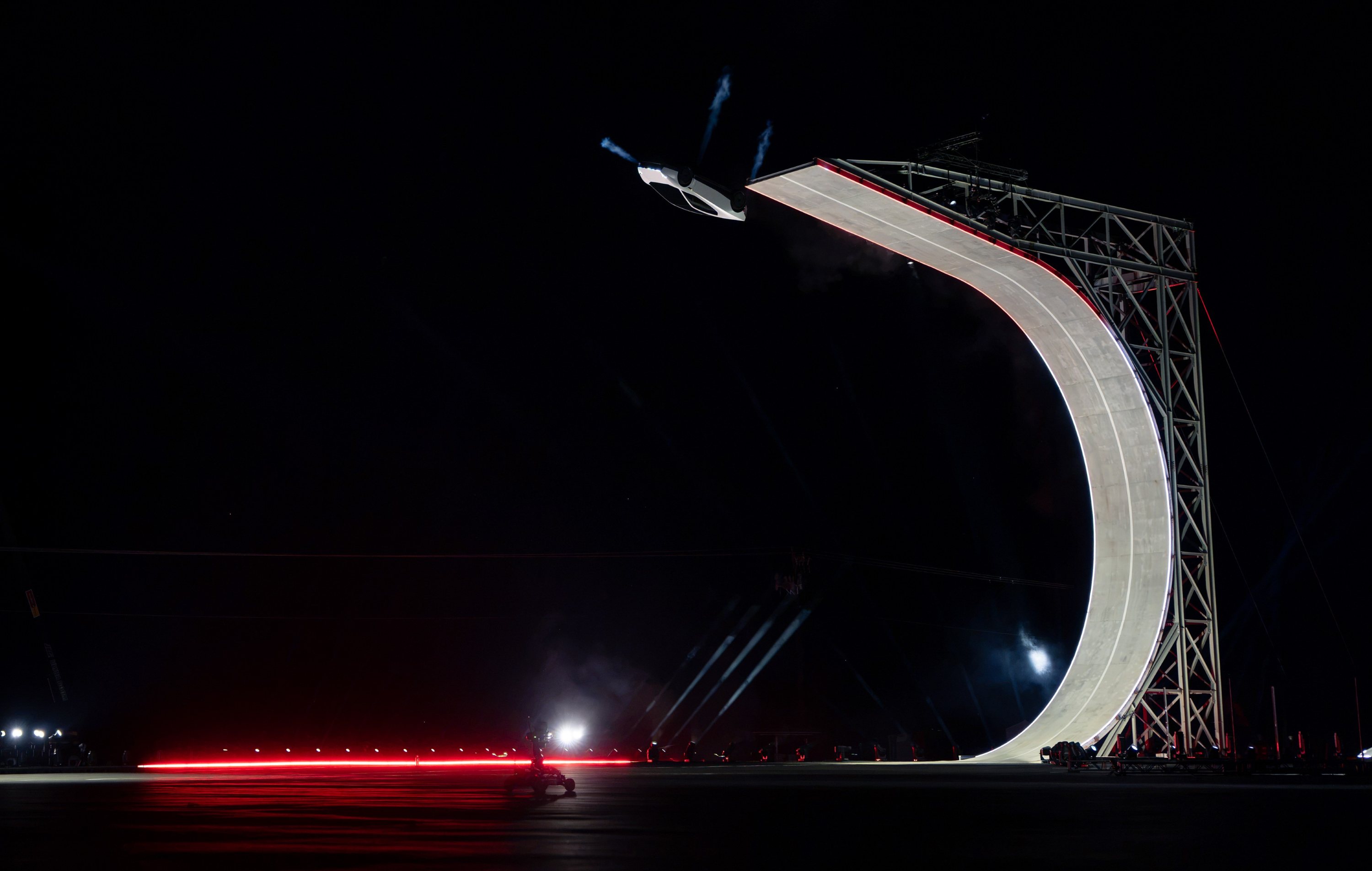 Tesla Roadster Rocket jumps off ramp upside down